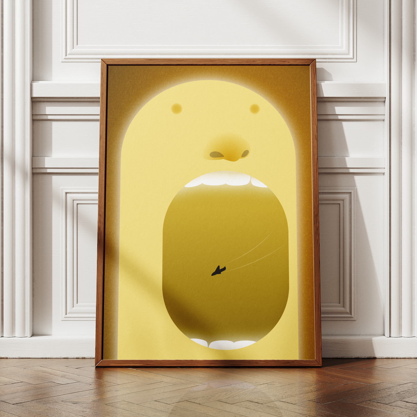 Framed artwork of a yellow abstract design on a white wall.